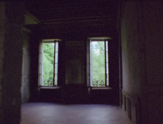 View walking into an empty room in an old house