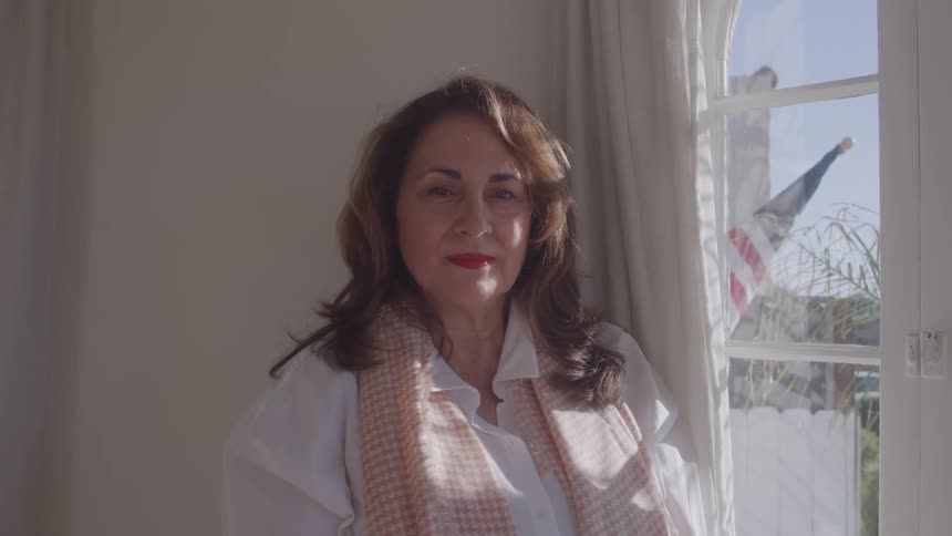 A woman looking at the camera