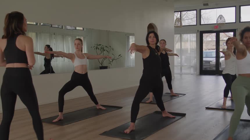 The women are attending a yoga class