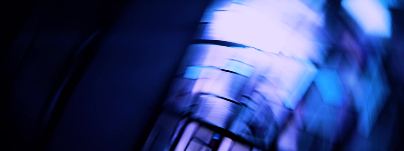 The camera rotates chaotically side to side in front of a stained glass window
