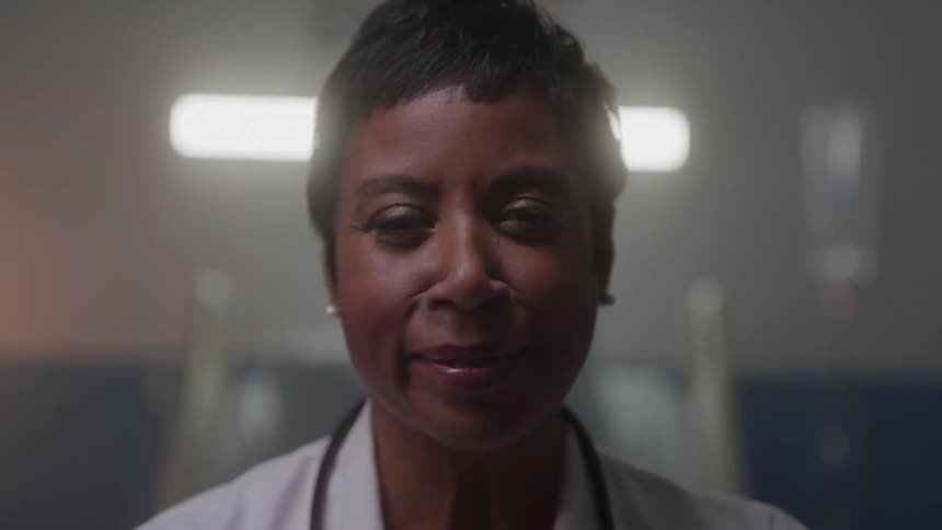 Confident expression of a healthcare professional in a hospital setting
