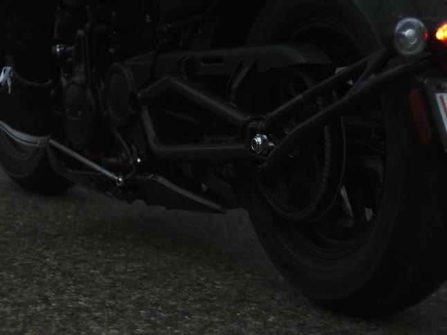 Closeup of the rear wheel of a motorcycle in motion