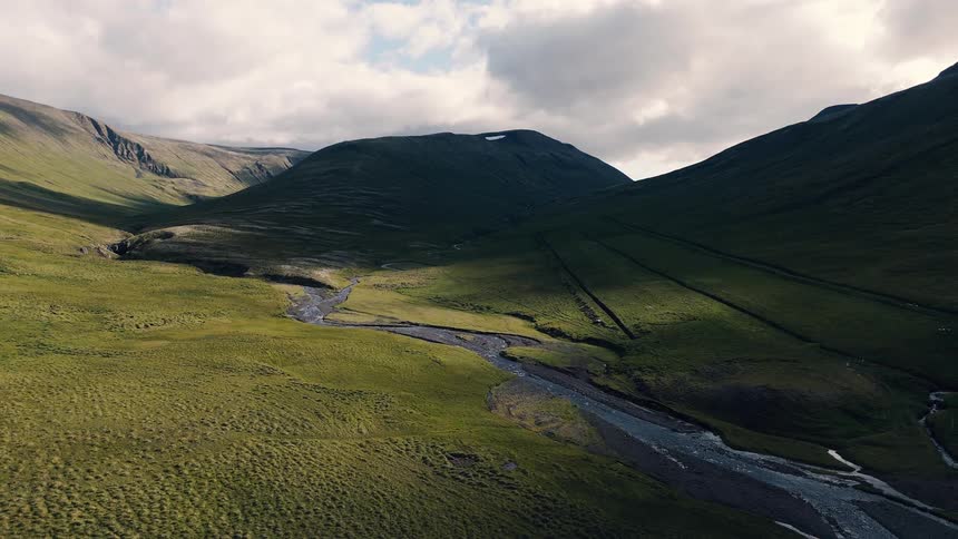 The stream runs down from the mountain