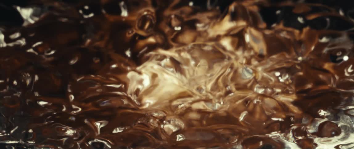 The water boils and light shines on it