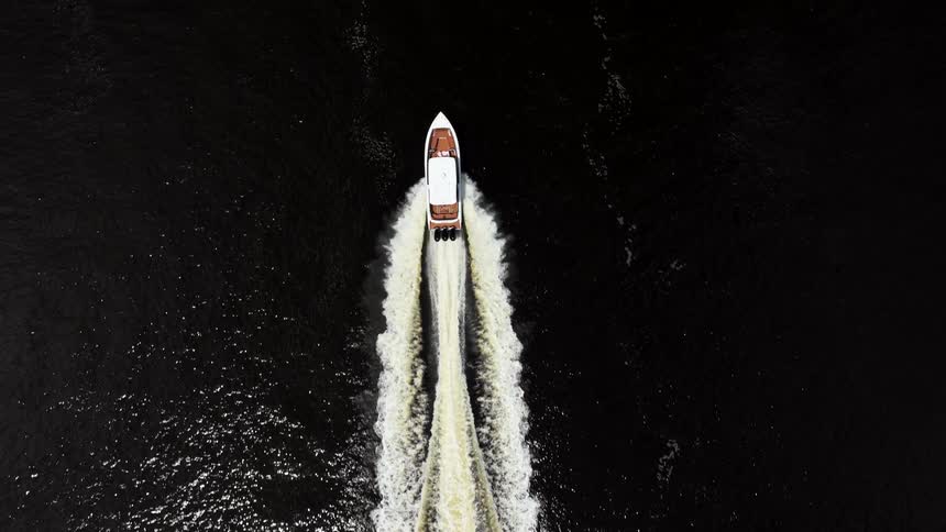 A boat sailing in the dark