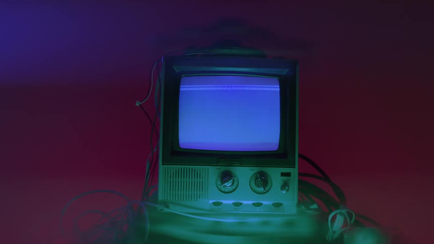 Classic television with no signal in a poorly lit room