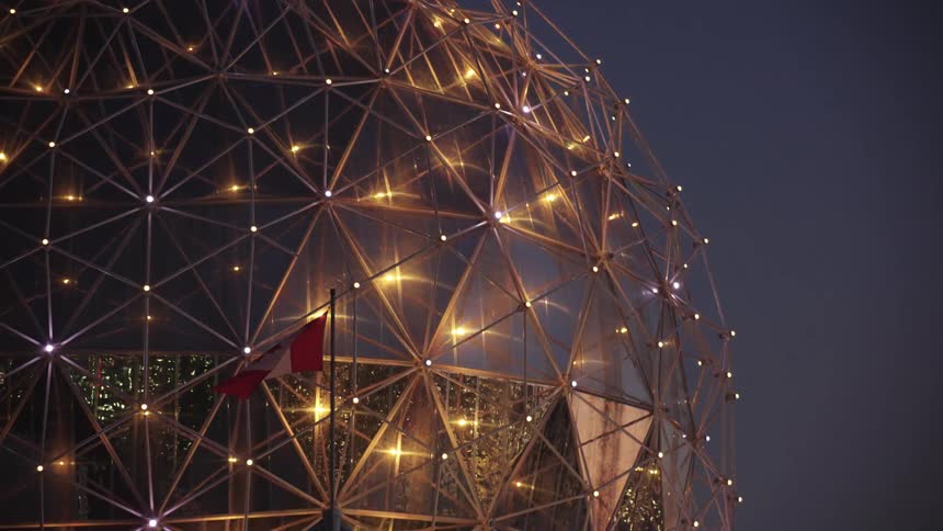 The orb shines by the flag