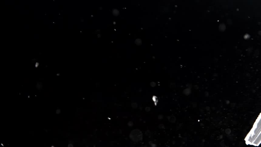 White baseball breaking glass