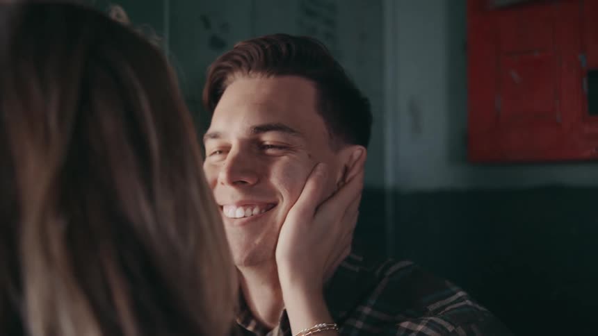 A couple facing each other