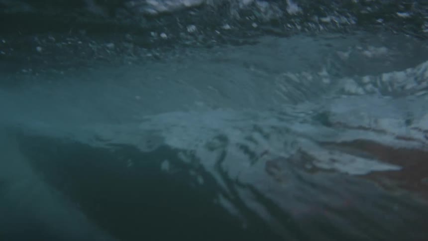 Ocean waves rising and falling