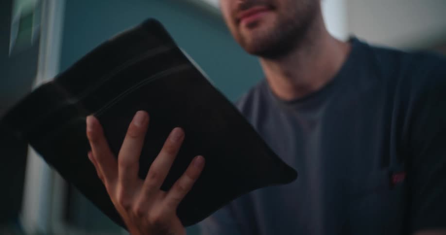 A man reading outside