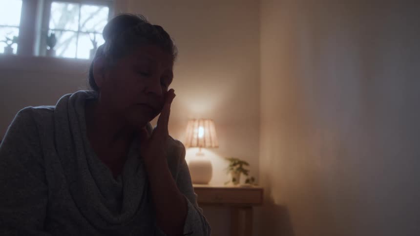 A woman sadly crying