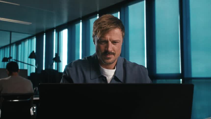a man zoning into focussed work mode
