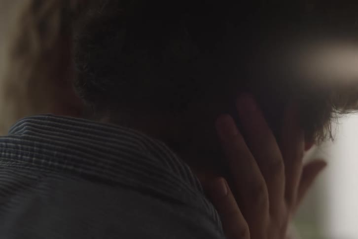 Gentle touch on someones neck during an intimate moment