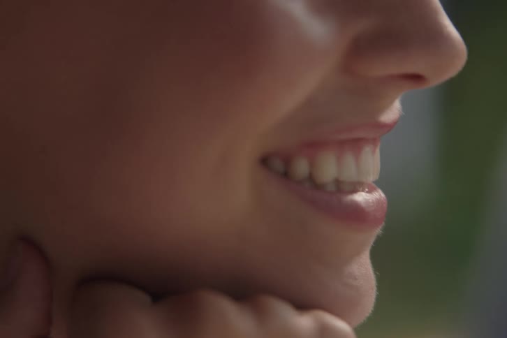 Woman smiling while talking