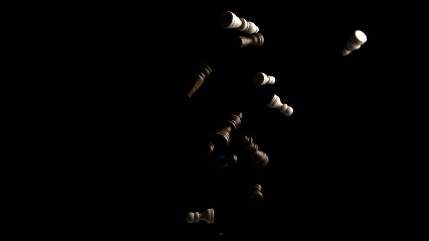 The chess pieces fly up and fall down