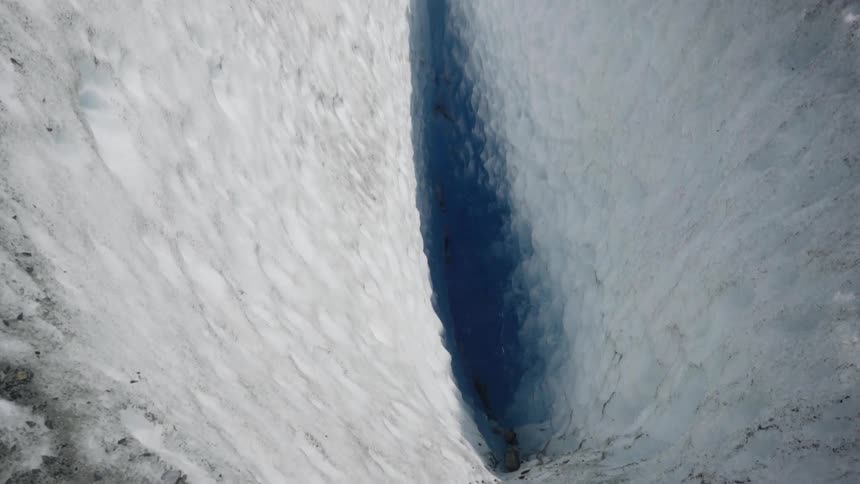 A view of something white with a small spot of blue in the middle