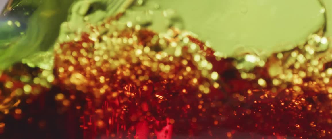 Red liquid flows and splashes