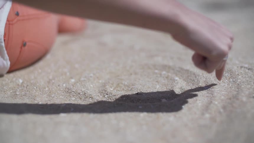 Person tracing in the sand