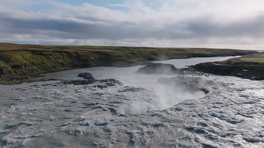 A river rushes away