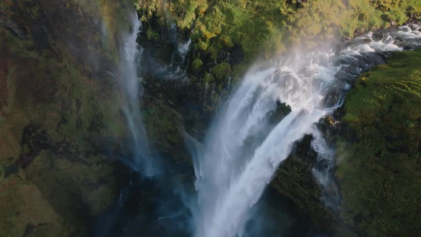 Water cascades down a cliff