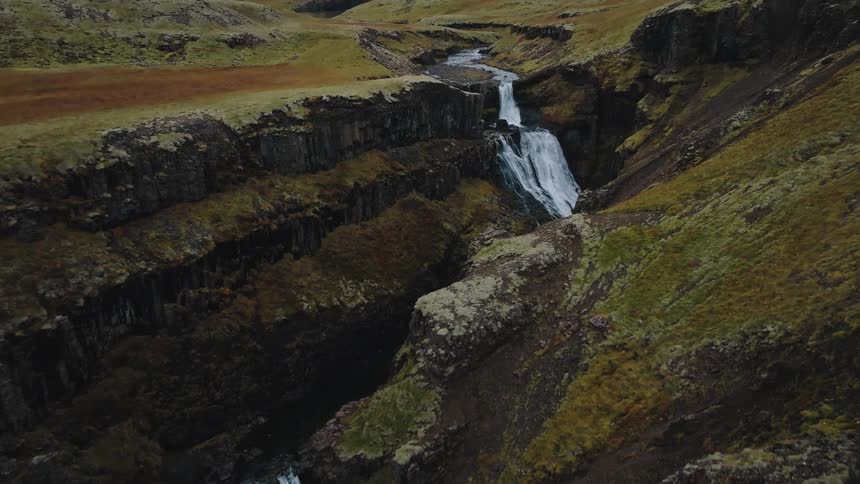 Water falls down into a notch