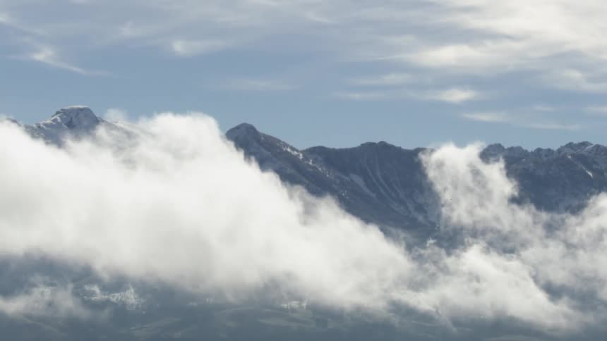 Clouds climb the mountains