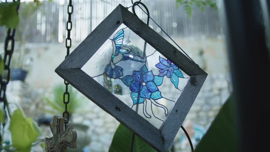Stained glass window in the rain