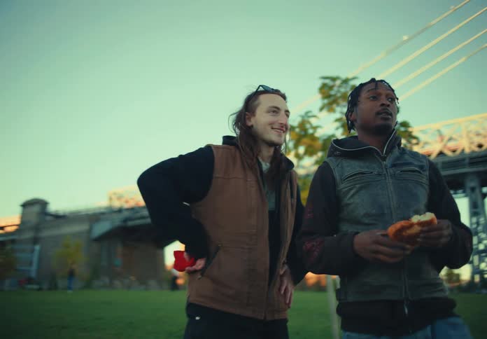 Friends talk together in the park