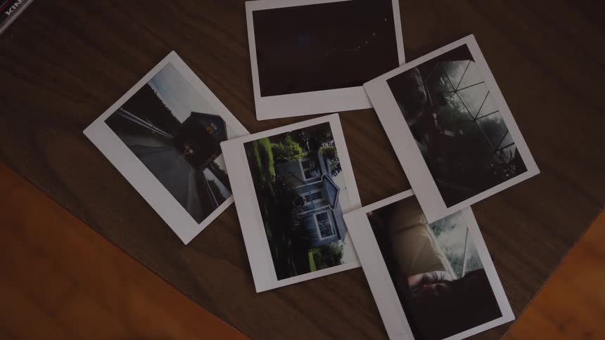 Several photos on a table