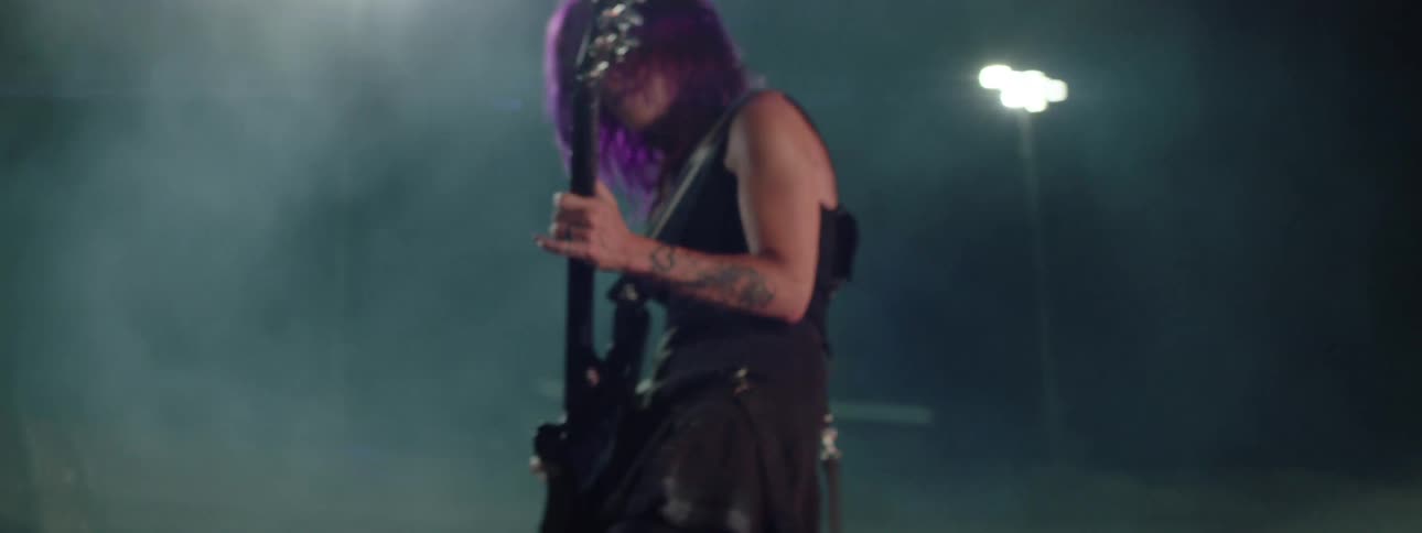 The band performs surrounded by smoke