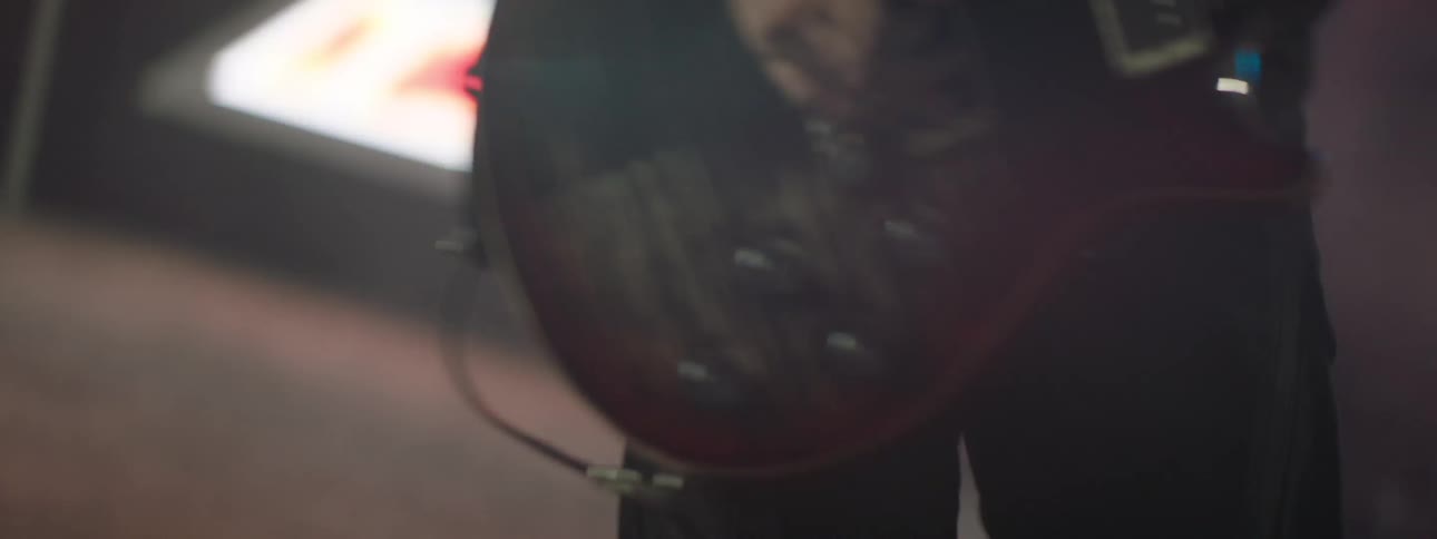 Close up of rock star playing guitar at a concert