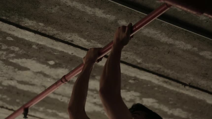Man performing pull ups