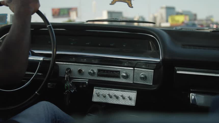 Drivers view inside a vintage car dashboard