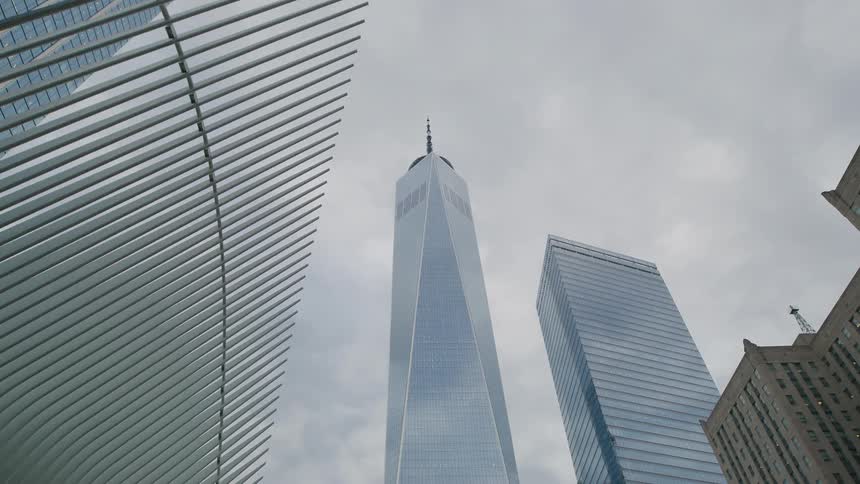 The clouds reflect on the skyscrapers