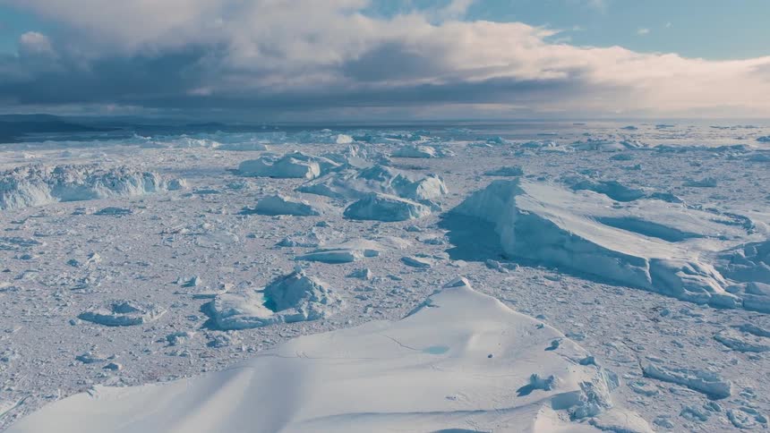 The landscape is covered in ice