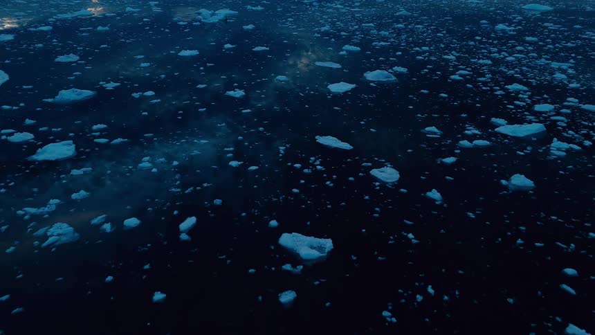 Melting ice floating on arctic water