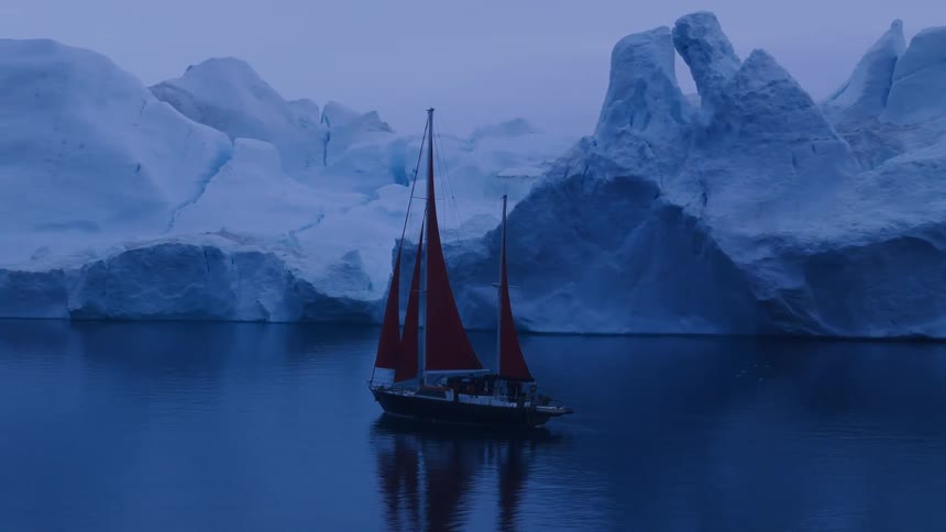 Crew on a ship sailing along the arctic coast