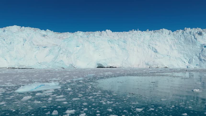 Glaciers and melting ice floating along the arctic coast