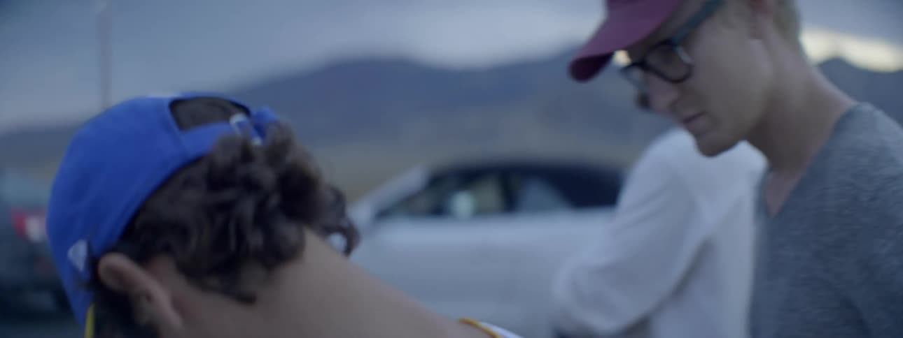 A person is flying a drone with a device