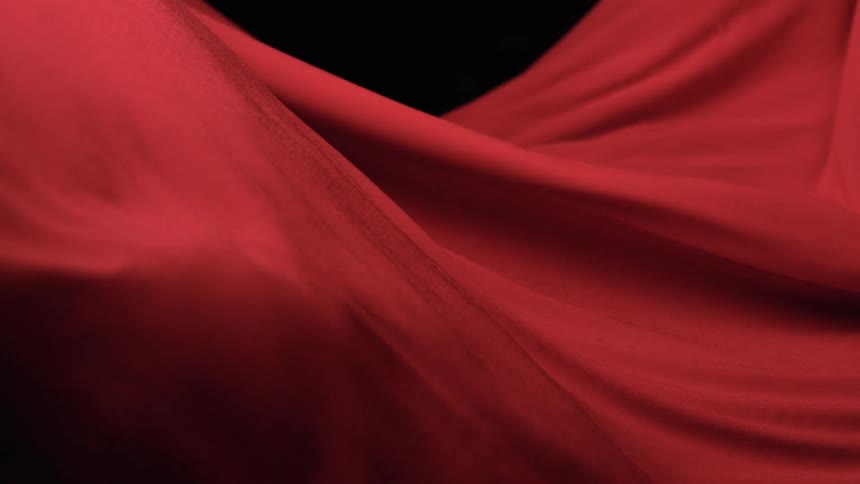 Red fabric flows like water