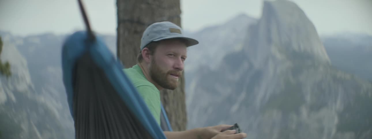 Man sitting in a hammock in nature