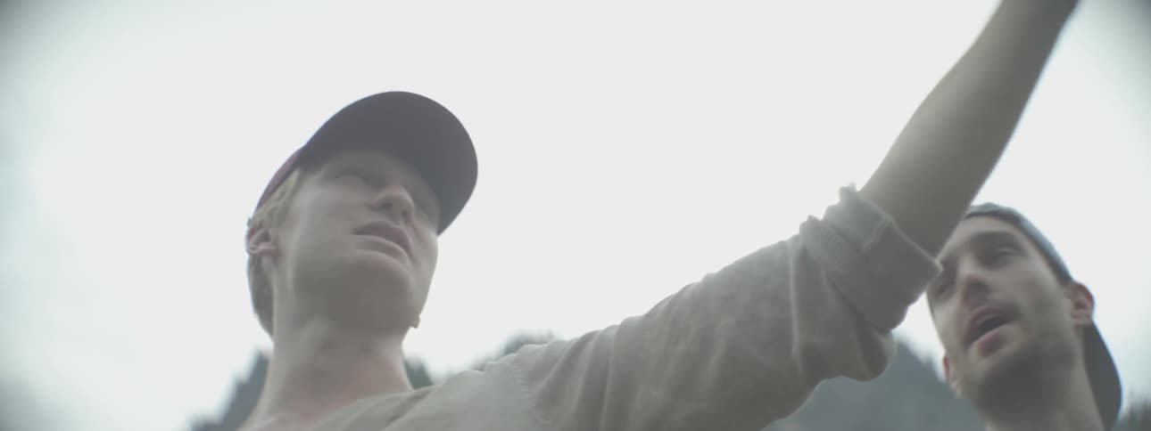 A man is talking and pointing around