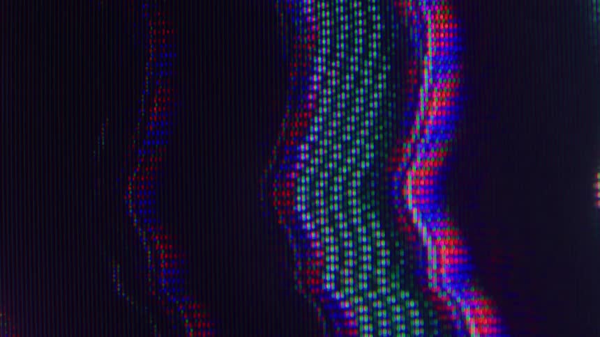 A closeup of a glitchy crt display shows wavy bands of rgb pixels and fine scanlines