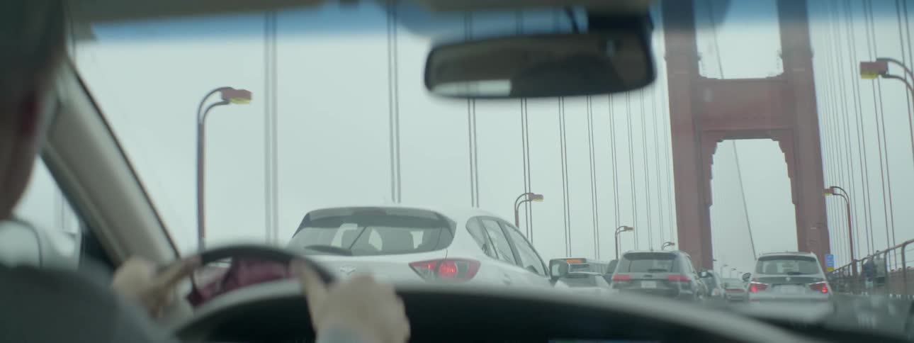Cars traveling over the golden gate bridge