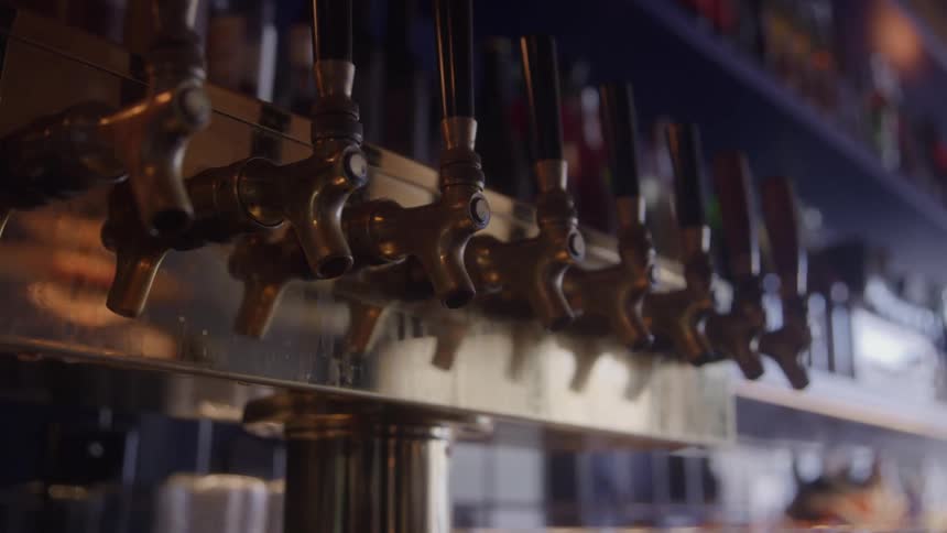 Beer taps are behind the bar