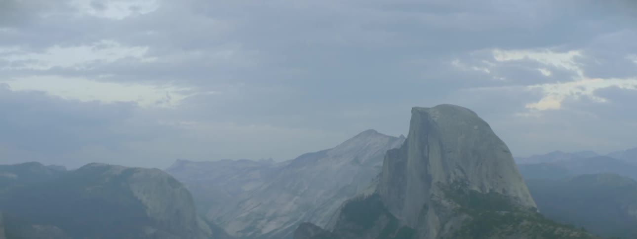 Clouds float over mountains