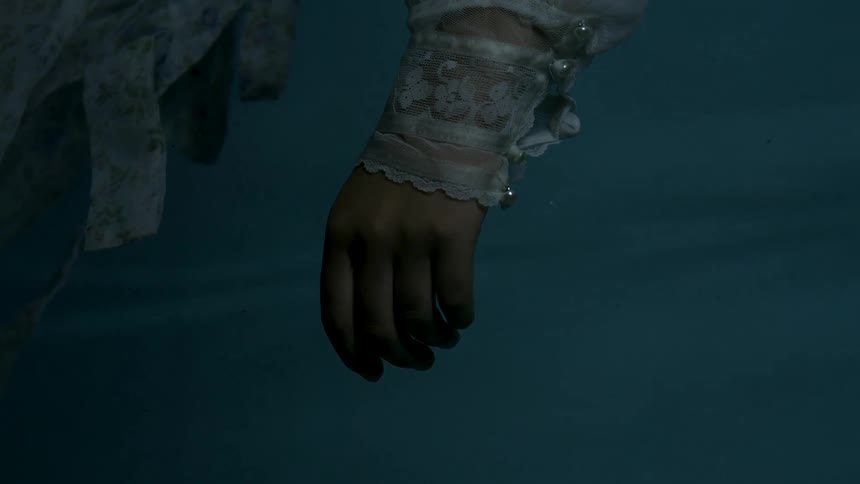 A mans hand dangling
