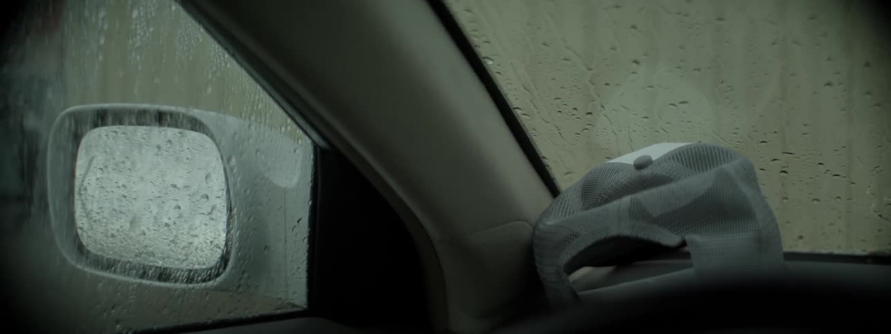 Inside of a car on a rainy day