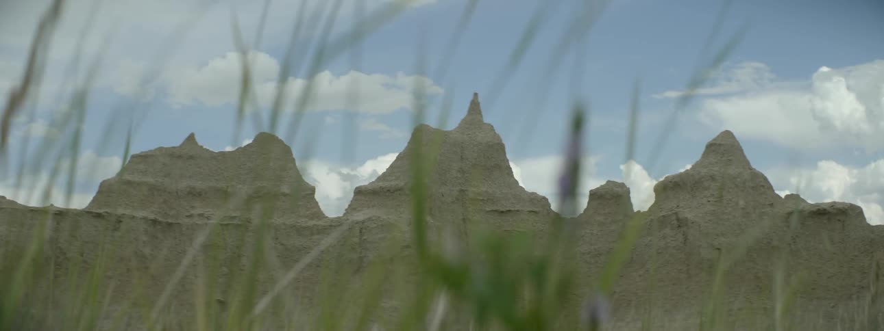 Dry and jagged mountain range on windy day